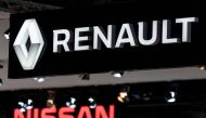 Renault and Nissan autocar logos are pictured during the Brussel Motor Show on January 09, 2020 in Brussel. / AFP / Kenzo Tribouillard 