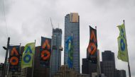 General view of flags infront of the Melbourne Skyline REUTERS/Ciro De Luca