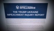 This omputer screen shows a copy of the Permanent Select Committee on Intelligence Report of The Trump-Ukraine Impeachment Inquiry Report on December 3, 2019 in Washington. AFP / Eric Baradat
