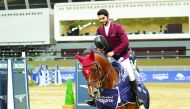 Nasser Al Ghazali riding What A Pleasure to the victory ceremony during the Medium Tour at Hathab Series Round Six at the Al Shaqab Arena yesterday.
