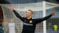 Borussia Dortmund's Erling Braut Haaland celebrates scoring their fifth goal to complete his hat-trick REUTERS/Michaela Rehle

