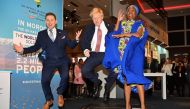 Britain's Prime Minister Boris Johnson (C), reacts as he visits the Pavegen's stand, a company that converts footsteps into energy, in the Innovation Zone at the UK-Africa Investment Summit in London on January 20, 2020. AFP Pool / Leon Neal
 