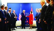 US President Donald Trump (C,L) shakes hands with Swiss Confederation President Simonetta Sommaruga ahead of their meeting at the World Economic Forum in Davos, on January 21, 2020. AFP / Jim Watson

