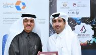 Qatar Chamber’s Director-General, Saleh bin Hamad Al Sharqi (right), and QIMC’s CEO Abdul Rahman Abdulla Al Ansari, after signing the sponsorship agreement in Doha recently.