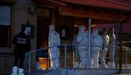 Police officers and forensic experts stand in front of the house where a shooting took place, in Rot am See, Germany, January 24, 2020. Reuters/Ralph Orlowski