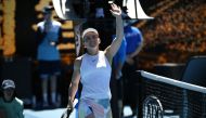 Romania's Simona Halep celebrates after a victory against Kazakhstan's Yulia Putintseva during their women's singles match on day six of the Australian Open tennis tournament in Melbourne on January 25, 2020. AFP / Manan Vatsyayana 