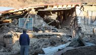 A villager looks at his collapsed house after an earthquake in Sivrice near Elazig, Turkey, January 25, 2020. REUTERS/Sertac Kayar
 