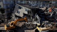 Rescue workers search the site of a collapsed building, after an earthquake in Elazig, Turkey, January 26, 2020. REUTERS/Umit Bektas
