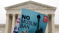 FILE PHOTO: Protesters rally outside the US Supreme Court while it  it weighs the legality of Trumps’ latest travel ban targeting people from Muslim-majority countries. Reuters / Yuri Gripas