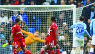 Manchester City midfielder Bernardo Silva (right) shoots to score their second goal during the English FA Cup fourth round match against Fulham at the Etihad Stadium in Manchester, northwest England, yesterday.