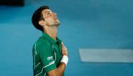  Serbia's Novak Djokovic reacts after his match against Canada's Milos Raonic. REUTERS/Edgar Su