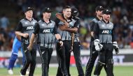 New Zealand’s Hamish Bennett (C) celebrates the wicket of India’s Rohit Sharma during the third Twenty20 cricket match between New Zealand and India at Seddon Park in Hamilton on January 29, 2020. / AFP / MICHAEL BRADLEY 
