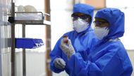 Medical staff with protective clothing are seen inside a ward specialised in receiving any person who may have been infected with coronavirus, at the Rajiv Ghandhi Government General hospital in Chennai, India, January 29, 2020. REUTERS/P. Ravikumar