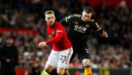 Manchester United's Luke Shaw in action with Wolverhampton Wanderers' Matt Doherty Action Images via Reuters/Jason Cairnduff
