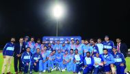 Indian players celebrate with the trophy after winning the fifth Twenty20 cricket match between New Zealand and India at the Bay Oval in Mount Maunganui on February 2, 2020. AFP / Michael Bradley