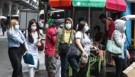 Filipinos wear face mask in Manila, Philippines on February 03, 2020. (Dante Diosina Jr / Anadolu Agency)
 