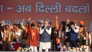 Indian Prime Minister Narendra Modi (C) greets supporters during a rally for the upcoming Delhi Legislative Assembly election, in New Delhi on February 3, 2020. AFP / Money Sharma
 