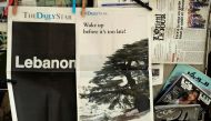 :(FILES) A file photo taken on August 08, 2019, shows the front pages of the Lebanese local English-language newspaper 