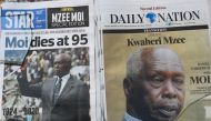 Newspapers with the headline on the death of former Kenya's president Daniel Arap Moi, are displayed, in Nairobi, on February 4, 2020. AFP / Simon Maina 
