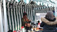 Market trader Amiira Ismail sells her Somali-inspired hot sauce at the 