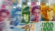 Various Euro banknotes lay next to various Swiss Franc notes in this picture illustration at a bank in Warsaw, July 18, 2011. Reuters / Kacper Pempel