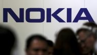 Visitors gather outside the Nokia booth at the Mobile World Congress in Barcelona, Spain, February 26, 2019. Reuters/Sergio Perez
