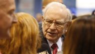 Warren Buffett talks to reporters as he tours the exhibit hall during the Berkshire Hathaway Annual Shareholders Meeting at the CenturyLink Center in Omaha, Nebraska, April 30, 2016.  Reuters / Ryan Henriksen