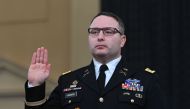 In this file photo taken on November 19, 2019 National Security Council Ukraine expert Lieutenant Colonel Alexander Vindman takes the oath before testifying before the House Intelligence Committee, on Capitol Hill in Washington, DC