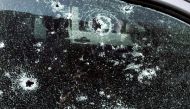 Bullet holes are pictured on the window of a victim's car following a gun battle involving a Thai soldier on a shooting rampage, in Nakhon Ratchasima, Thailand, February 9, 2020. Reuters/Athit Perawongmetha