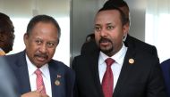 Prime Ministers of Ethiopia and Sudan Abiy Ahmed and Abdalla Hamdok attend the opening session of the 33rd African Union Heads of State Summit in Addis Ababa. M?nasse Wond?mu Ha?lu / Anadolu Agency 
 