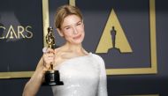 Renee Zellweger poses with her Oscar for Best Actress in 