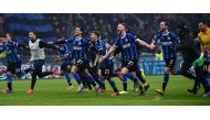  Inter Milan's team celebrates at the end of the Italian Serie A football match Inter Milan vs AC Milan on February 9, 2020 at the San Siro stadium in Milan. / AFP / MARCO BERTORELLO