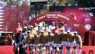 Men's champions, Universidad Nacional Autónoma de México (UNAM) team players and officials posing for a photograph with the Ambassador of the State of Qatar to Mexico, H E Mohammed bin Jassim Al Kuwari, during the presentation ceremony on Sunday. 