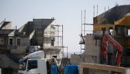 Israeli settlements under construction are seen in Palestinian lands in Jerusalem on December 29, 2016. Daniel Bar / Anadolu Agency