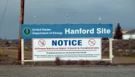This file photo taken on March 17, 2011, shows a sign warning visitors of searches for prohibited materials as they near the Hanford nuclear site in Hanford, Washington. AFP / Shaun Tandon