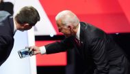 Pete Buttigieg leans in to a selfie by Joe Biden with the crowd at the end of the fourth US Democratic presidential candidates 2020 election debate at Otterbein University, October 15, 2019. Reuters / Shannon Stapleton