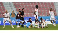 Al Arabi and Al Wakrah players in action during yesterday's opening quarter-final match of the Ooredoo Cup at the Al Arabi Stadium yesterday. Picture: Anvar Sadath