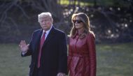 WASHINGTON, DC - FEBRUARY 14: U.S. President Donald Trump and First Lady Melania Trump walk to the south lawn heading to Palm Beach for the weekend on February 14, 2020 in Washington, DC. Tasos Katopodis/AFP