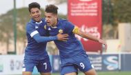 Mohammed VI Academy 's Skipper Omar Sadik (right) celebrates after scoring a hat-trick against Altinordu during their Al Kass International Cup match in Doha, yesterday.