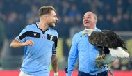Lazio's Italian forward Ciro Immobile (L) reacts next to the club's mascot eagle at the end of the Italian Serie A football match Lazio Rome vs Inter Milan on February 16, 2020 at the Olympic stadium in Rome. / AFP / Filippo MONTEFORTE