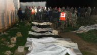 Syrian government forces uncovering a mass grave containing bodies of people reportedly believed to have died between 2012 and 2014, in al-Ubb in the eastern Ghouta region about 20 kilometres east of the capital Damascus, which was formerly held by rebel 