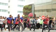 Holiday Villa staff taking part in a marathon during the National Sport Day celebrations.