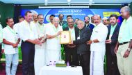 E T Muhammed Basheer MP, presenting a memento of honour to Muhammed Easa, NRI buisinessman and President of Qatar Indian Football Federation.