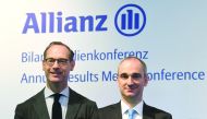 Oliver Baete (L), CEO of German insurance group Allianz, and Allianz CFO Giulio Terzariol, pose prior to the company's annual results press conference in Munich, southern Germany, on February 21, 2020. / AFP / Christof Stache
