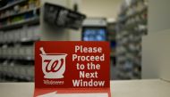 A sign rests on a counter at a Walgreens pharmacy store in Austin, TX, US, March 26, 2018.  Reuters/Mohammad Khursheed
 