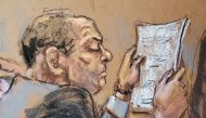 Harvey Weinstein sits at the defense table reading papers during jury deliberations in his sexual assault trial in the Manhattan borough of New York City, New York, US, February 24, 2020 in this courtroom sketch. Reuters/Jane Rosenberg
 