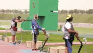 Qatar’s Olympic-bound Mohammed Al Rumaihi (left) in action during the Men’s Trap event of the Qatar Open Shotgun Championship at the Losail Shooting Range, yesterday. Pictures: Syed Omar