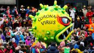 A figures depicting the coronavirus is pictured during the 