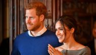 Prince Harry and Meghan Markle watch a performance by a Welsh choir in the banqueting hall during a visit to Cardiff Castle, Britain, January 18, 2018. Reuters / Ben Birchall