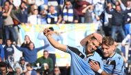 Lazio's Joaquin Correa celebrates scoring their second goal with teammate Ciro Immobile REUTERS/Alberto Lingria